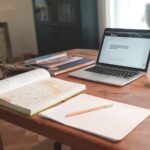macbook air on brown wooden table